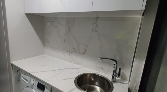 Complete Laundry setup with stone top