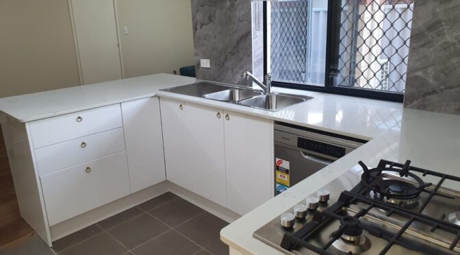 New Kitchen with stone benchtop and splasback