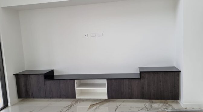 Tv wall  Cabinetry with stone tops